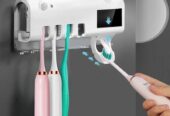 Multi functional tooth brush sterilizer