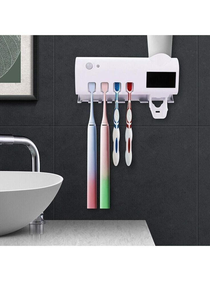 Multi functional tooth brush sterilizer
