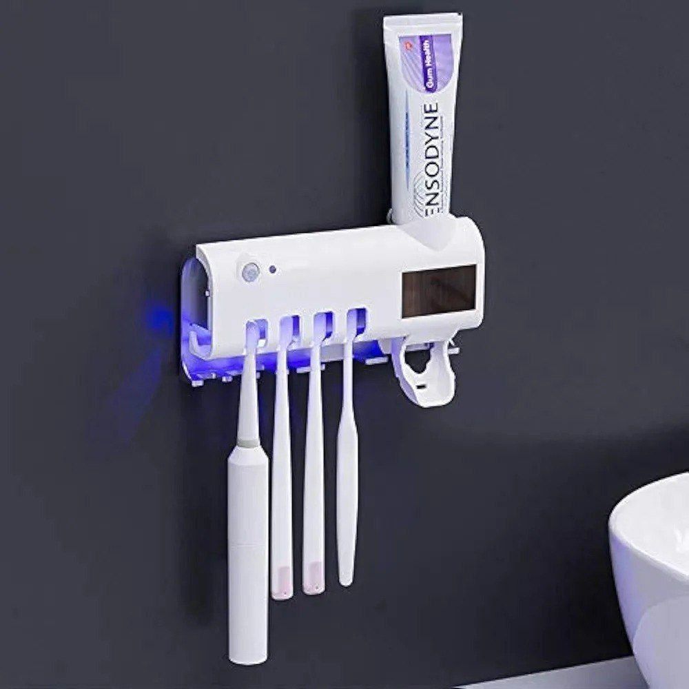 Multi functional tooth brush sterilizer