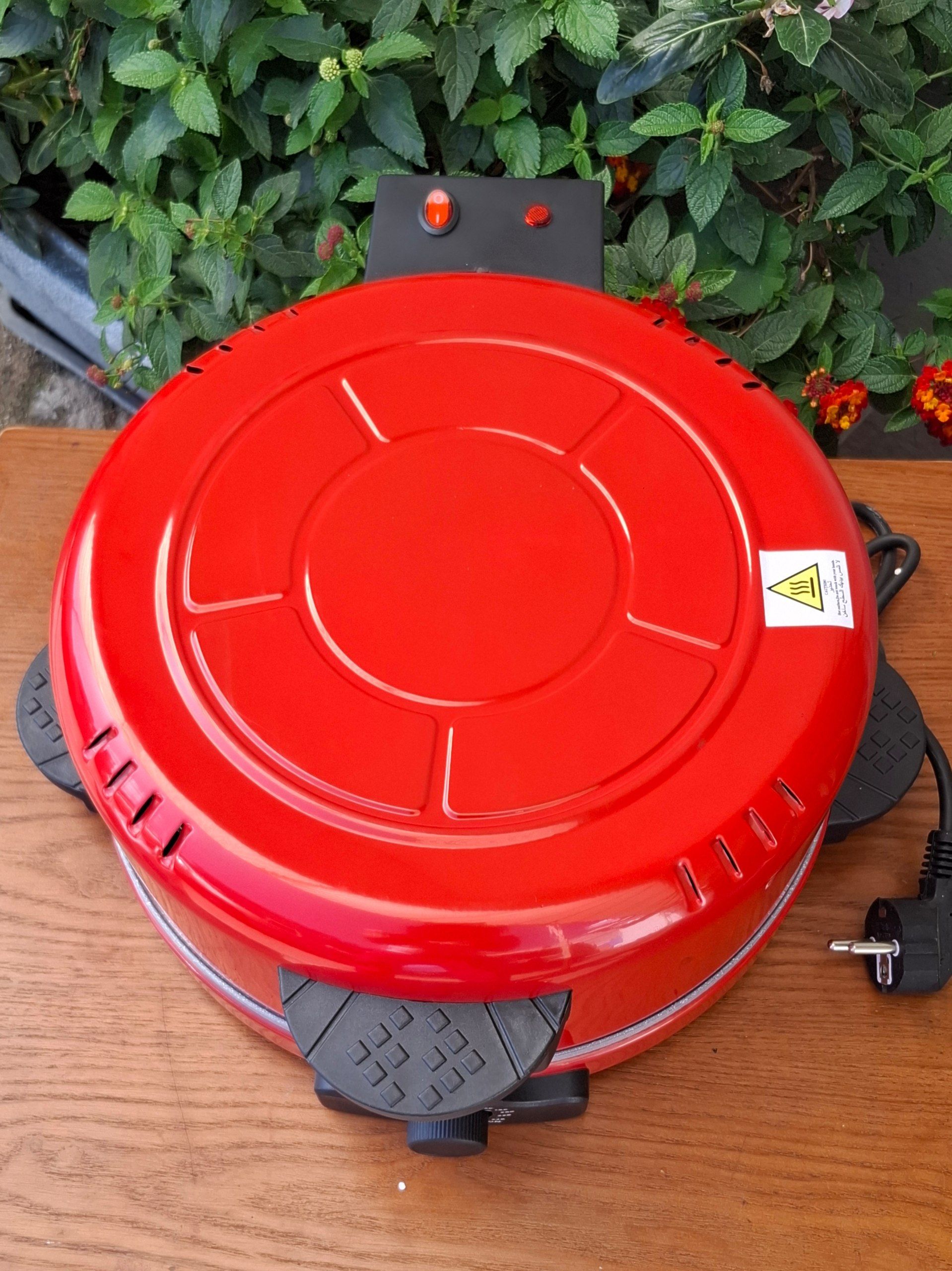 Electrical bread and pizza maker