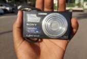 Sony Cyber-shot DSC-W610 digital camera, a black compact model featuring a 14.1-megapixel sensor.