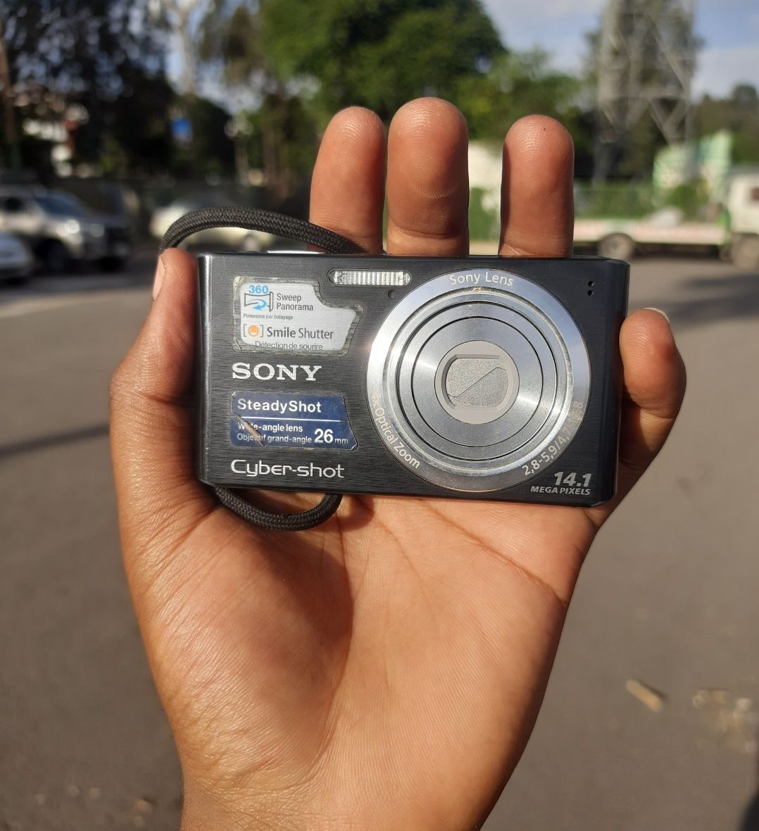 Sony Cyber-shot DSC-W610 digital camera, a black compact model featuring a 14.1-megapixel sensor.