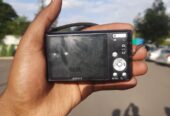 Sony Cyber-shot DSC-W610 digital camera, a black compact model featuring a 14.1-megapixel sensor.