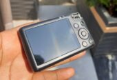Canon PowerShot SD850 IS Digital ELPH camera featuring a distinctively curved design.